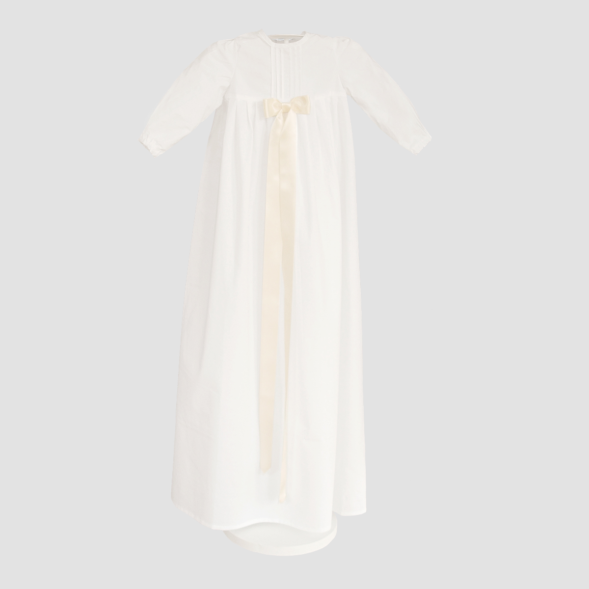 Minimundus dopklänning av 100% ekologisk bomull med breda cremefärgade satinband